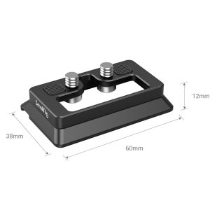 SmallRig 3154 Arca-Swiss QR-levy DJI RS2 / RSC2:lle on musta suorakulmainen työkalu, jossa on kaksi metallista nuppia yläosassa ja jonka mitat ovat 38 mm leveä, 60 mm pitkä ja 12 mm korkea.