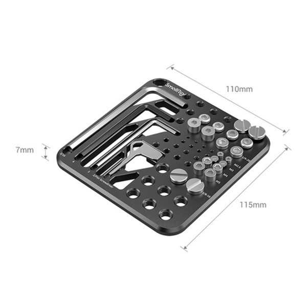 SmallRig-3184-3 The SmallRig 3184 Screw & Hex Key Storage Plate is a black metal organizer with multiple slots and cutouts for small cylindrical parts and tools, measuring 110mm x 115mm x 7mm.