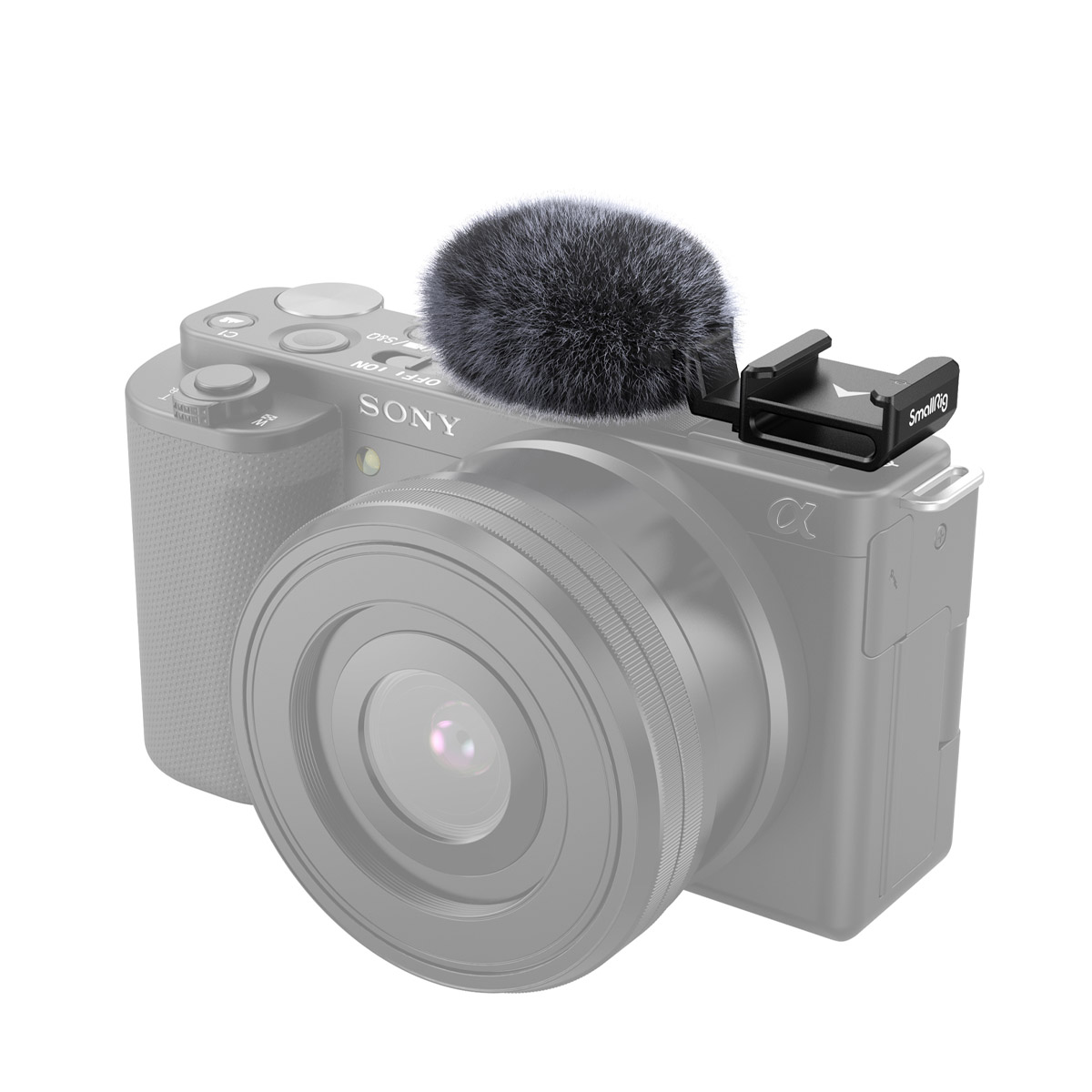 The SmallRig 3526 Cold Shoe Adapter with Windshield is attached to a Sony ZV-E10 or ZV-1 camera, making the microphone accessory stand out on the compact camera, while the body is greyed out for emphasis.