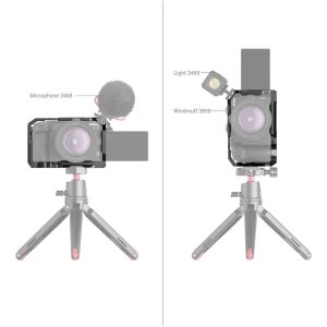 Kaksi Nikon Z30 -kameraa, jotka molemmat on kiinnitetty SmallRig 3858 Cage -kamerahäkkiin, ovat pienillä jalustoilla. Vasemmalla on mikrofoni, jossa on tuulipeite; oikealla on suorakulmainen valo, johon on kiinnitetty tuulipeite. Molemmissa kameroissa on ulosvedettävät näytöt.