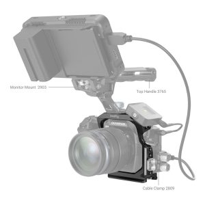 The picture shows the SmallRig 3948 camera cage for OM system OM-1 with lens mounted and accessories marked: top handle 3765, monitor mount 2903 and cable mount 2809.