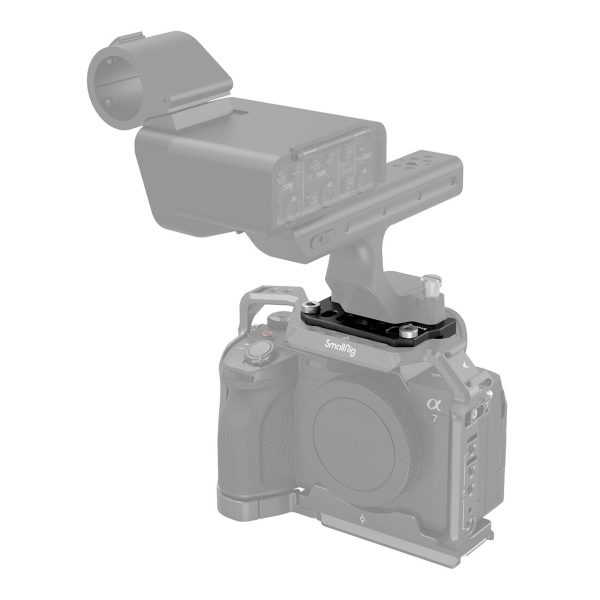 Sony Alpha -kamerarigi puoliksi läpinäkyvällä harmaasävyllä, jossa on SmallRig 4019 Adapter Plate for Sony FX3 XLR Handle, jossa on suojahäkki, ylhäältä kiinnitetty kahva ja kiinnitetty ääniliitäntä.