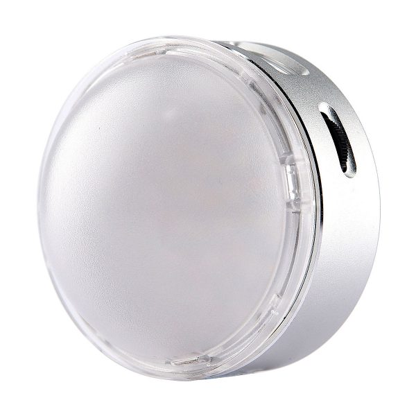 The Godox R1 is a small, round, silver-coloured, frosted plastic device with a clear dome-shaped lid, shown against a white background.