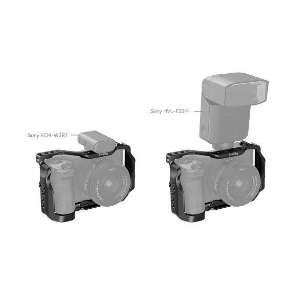Two Sony Alpha 6700 cameras in SmallRig 4336 Cage Kits. The left is a Sony ECM-W2BT wireless microphone and the right is a Sony HVL-F32M flash. Both cameras appear partially greyed out.