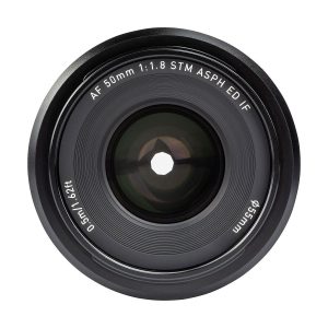 In the close-up of the Viltrox AF 50mm f/1.8 lens, the front element of the Sony E lens reads "AF 50mm 1:1.8 STM ASPH ED IF, 0.5m/1.62ft ø55mm", highlighting the aperture and detailed engravings.