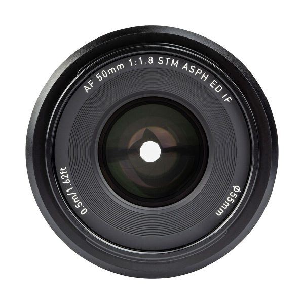 In the close-up of the Viltrox AF 50mm f/1.8 lens, the front element of the Sony E lens reads "AF 50mm 1:1.8 STM ASPH ED IF, 0.5m/1.62ft ø55mm", highlighting the aperture and detailed engravings.