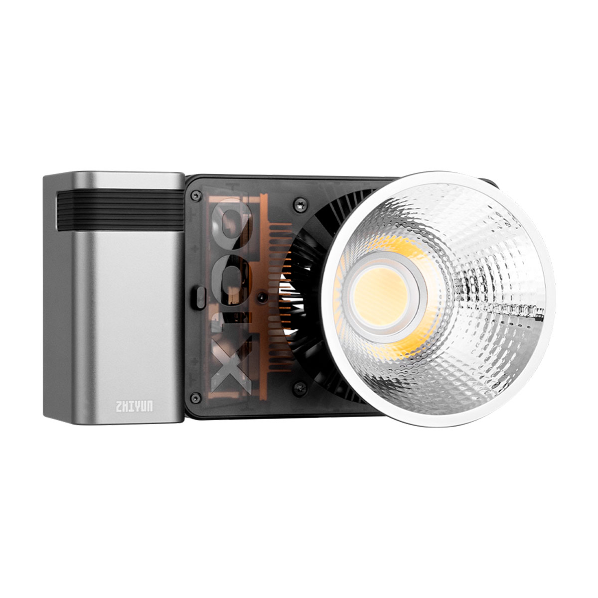 Zhiyun LED Molus X100 COB Light Pro on kompakti, suorakulmainen studiovalaisin, jossa on suuri hopeinen heijastinlevy, mustat jäähdytysripat ja sivussa näkyvä Zhiyun-brändinimi.