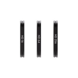DJI_Osmo_3_008 Three thin, round DJI Osmo Pocket 3 magnetic filters (ND 16, ND 64 and ND 256) stand vertically next to each other on a white background.