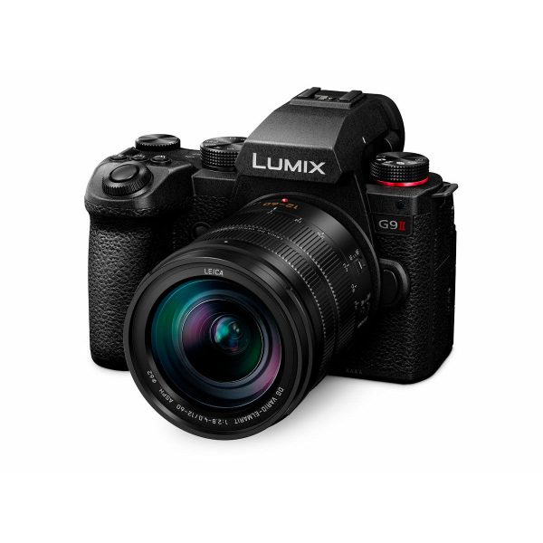 The Panasonic Lumix G9 II + 12-60mm LEICA F2.8-4.0 Kit is shown in black, slightly tilted to the left on a white background, with a textured grip and visible control buttons.