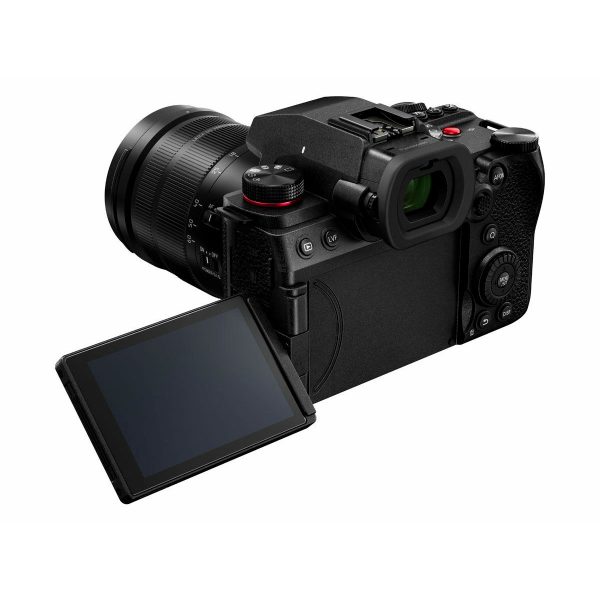 The Panasonic Lumix G9 II + 12-60mm LEICA F2.8-4.0 Kit features a black camera body with a large lens, side-facing LCD screen, visible rear controls, viewfinder and a range of buttons and dials.