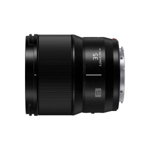 Side view of the Panasonic Lumix S 35mm f/1.8 lens, showing the markings "35" and "0.24m/0.79ft" on the right side, ribbed focus ring and metal lens mount.