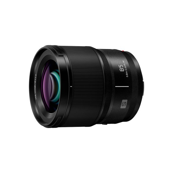 The Panasonic Lumix S 85mm f/1.8 lens is a black lens with "85" and "S" markings, a textured focusing ring and purple and blue reflective glass elements isolated on a white background.