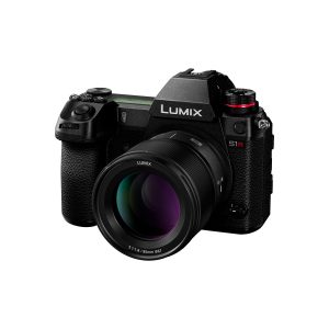 Black Panasonic Lumix S1R mirrorless digital camera with Panasonic Lumix S 85mm f/1.8 lens attached, shot on a white background.