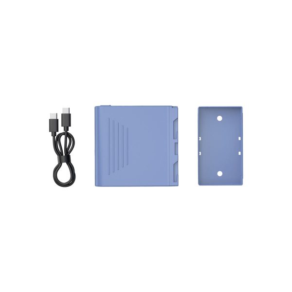 The SmallRig 4267 USB-C rechargeable camera battery NP-F970, with a light blue rectangular plastic case in two parts, is displayed next to a black USB-C charging cable on a white background.
