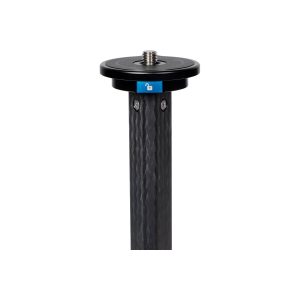 A close-up of the Sirui ST-224 carbon fibre tripod shows its textured black carbon fibre pole, round flat mounting plate and threaded screw on top against a white background.