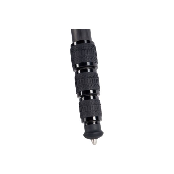 Close-up of the Sirui ST-224 carbon fibre tripod with textured rubber screw locks and sharp metal foot, shown against a white background.