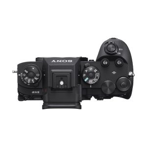 Top-down view of the black Sony A9 III system camera, showing the control dials, buttons and switches, including the mode dial, on/off switch, shutter button and custom function buttons.