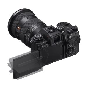 The Sony A9 III system camera has a large lens, black body and articulated LCD screen that swings out from the back and tilts or swivels for a flexible viewing angle.