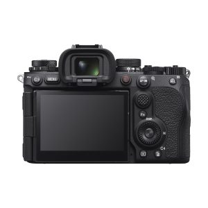 The Sony A9 III system camera has a black body with textured grips, a large LCD screen, viewfinder, multiple buttons, dials and clearly marked control labels on the back.