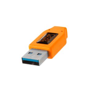 The orange Tether Tools TetherPro USB 3.0 Active extension cable (4.9 m) appears on a white background and is positioned in a corner with its metal connector facing forward.