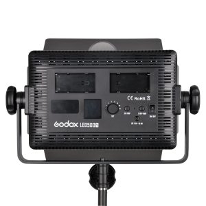 1448269121_242 The rear view of the Godox LED 500Y Tungsten on Barndoor shows the control buttons, battery compartments, air vents and tripod mounting bracket.