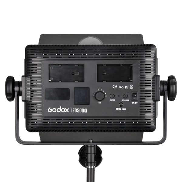 1448269121_242 The rear view of the Godox LED 500Y Tungsten on Barndoor shows the control buttons, battery compartments, air vents and tripod mounting bracket.