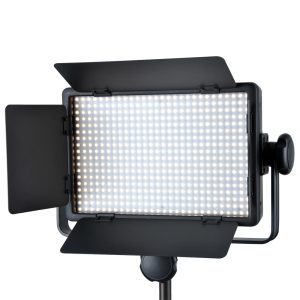1448269121_583 The Godox LED 500Y Tungsten with Barndoor is a rectangular studio light with adjustable metal barn doors, mounted on a stand and emitting a bright tungsten light.