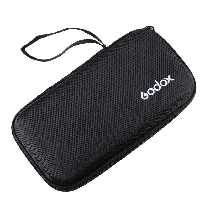 The Godox AK-R18 is a black, textured, rectangular zippered carrying case with a wrist strap and the Godox logo printed on the white front.