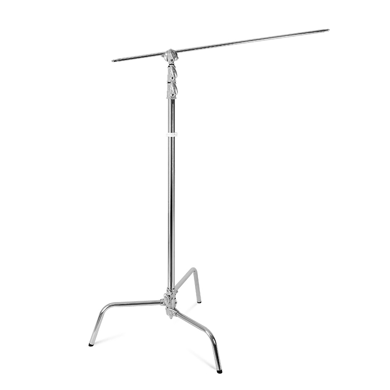 The Godox 270CS C-Stand with Arm & Grip Head 270cm is a silver coloured metal stand with three legs, adjustable height and long arm, ideal for holding lights or equipment in photography and film production.