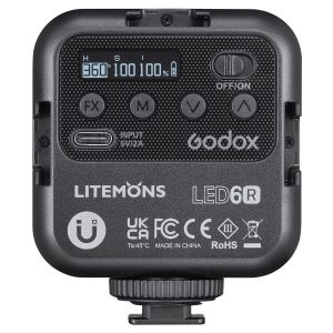 Close-up of the back of the Godox Litemons LED Light (RGB) LED6R with display, control buttons, USB-C interface and certification labels. The display shows a 360° HSI mode with both brightness and saturation set to 100%.