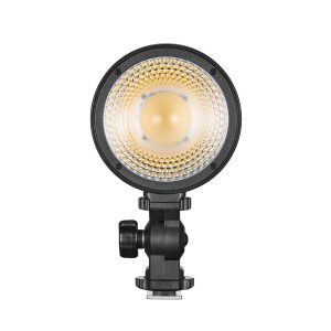 Godox Litemons LED LC30D Tabletop Video Light Single Light Kit -valaisinsarjassa on pyöreä LED, jossa on hunajakennokuvioinen heijastin, säädettävä kannatin, jossa on nuppi, ja jalustassa on hot shoe -sovitin joustavaa kiinnitystä varten.