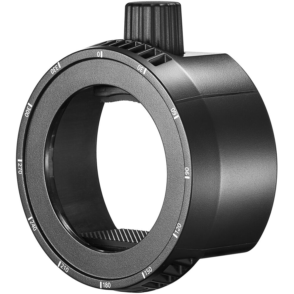 Godox-sovittimen pidike Fresnel-salamapäähän AK-R25 on musta sylinterinmuotoinen lisävaruste, jossa on suuri keskiaukko ja yläreunan nuppi, jossa on numerosäädöt sen ulkoreunan ympärillä.