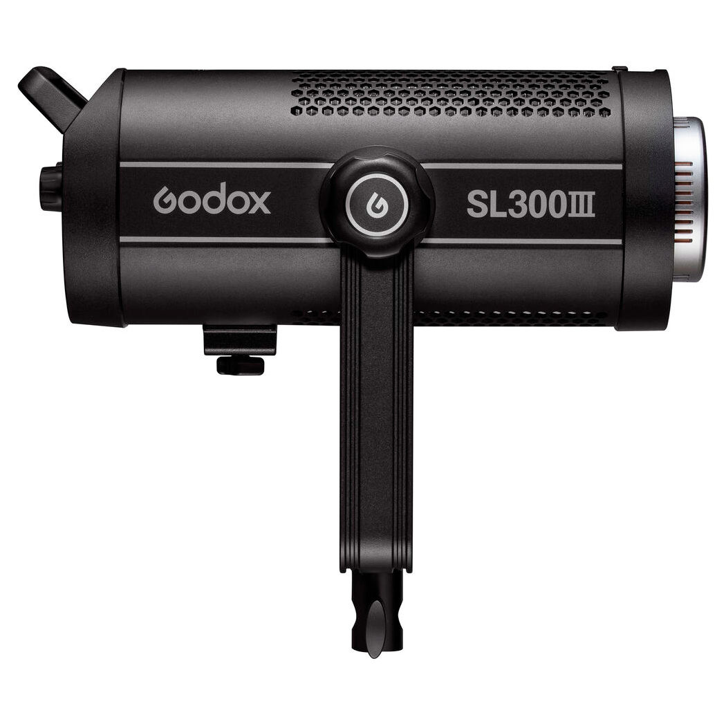 The Godox SL300III LED video light is shown from the side, highlighting the control knob, brand logo, model name on the cylindrical body and bracket on the base.