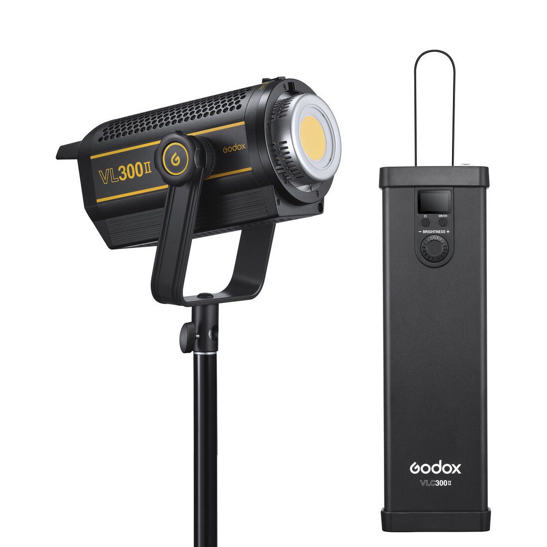 The black Godox VL300II LED video light with yellow logo is mounted on a stand next to its rectangular power control unit with control wheel and display.