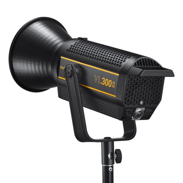 Black Godox VL300II LED Video Light with large reflector on stand, ventilated housing and yellow side marker.