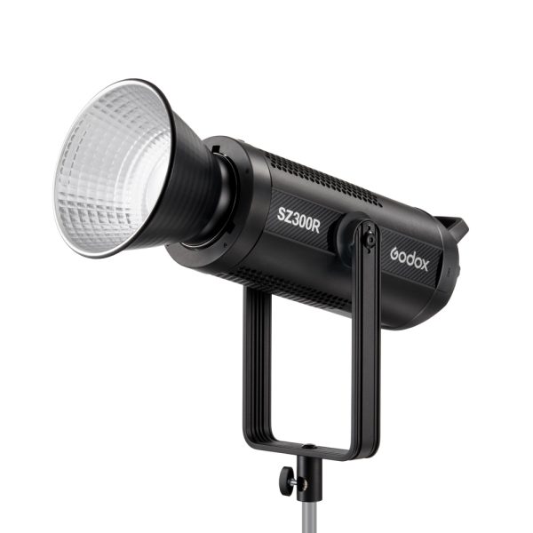 The black Godox SZ300R Zoom RGB LED Video Light with a large reflector is mounted on a metal base and displayed from the front against a white background.