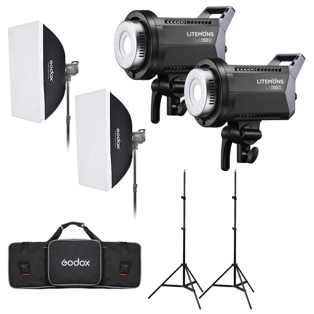 Godox Litemons LA150D Daylight Duo Kit -LED-valo, jossa on kaksi LED-valoa, softboxit, jalustat ja musta Godox-laukku, on järjestetty valkoiselle taustalle esittelemään tätä täydellistä studiovalosarjaa.