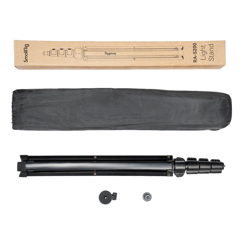 SmallRig 4379 RA S200 Light Stand, a foldable black tripod, includes a black carrying case, two small mounting accessories, and is supplied in a brown cardboard box marked "RA-S200 Light Stand", all on a white background.