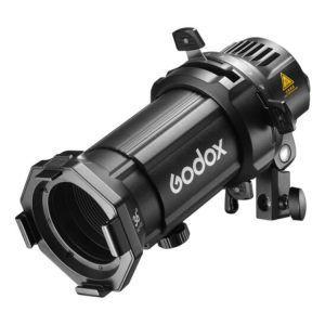 Godox Spotlight Attachment MLP36K ML30/ML60 LED-valoille on musta sylinterinmuotoinen projektorin lisävaruste, jossa on säätönupit, kiinnityskannatin ja varoitustarra.