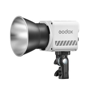 The Godox ML60II BI Battery Kit LED luminaire has a silver reflector and a white body mounted on a black adjustable bracket, shown against a white background.