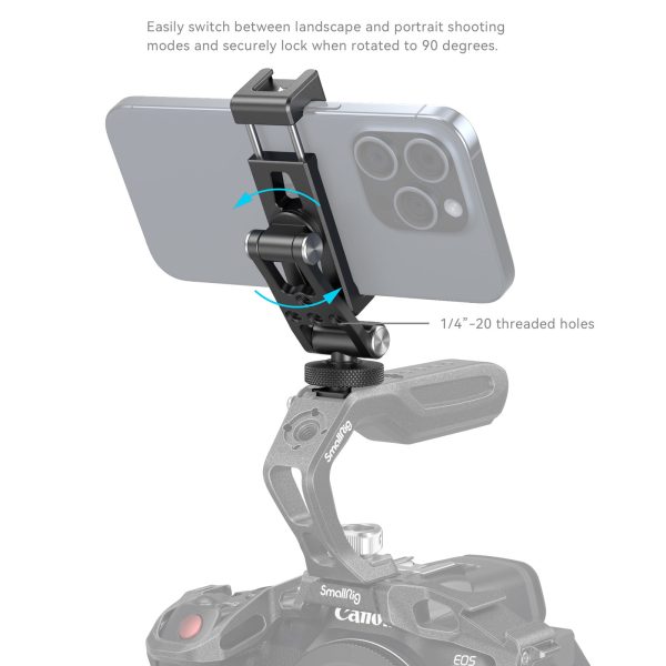 SmallRig 4382 Metal Phone Holder with Cold Shoe Mount -metallipuhelinpidikkeellä voit kääntää älypuhelinta kameran kahvassa maisema- ja muotokuvatilojen välillä. Siniset nuolet osoittavat kääntämisen, ja teksti korostaa 1/4-20-kierteisiä kiinnitysreikiä.
