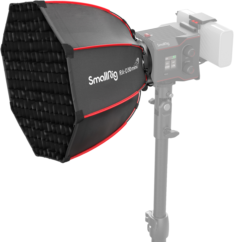 Ammattimainen studiovalaisin SmallRig 4358 Mini Parabolic Softbox RA-D30 RC 60 B:lle, jossa on kuusikulmainen softbox ja ritilä jalustalle asennettuna. Valaisimen rungossa on "SmallRig" ja "RA-D30 mini" -brändi.