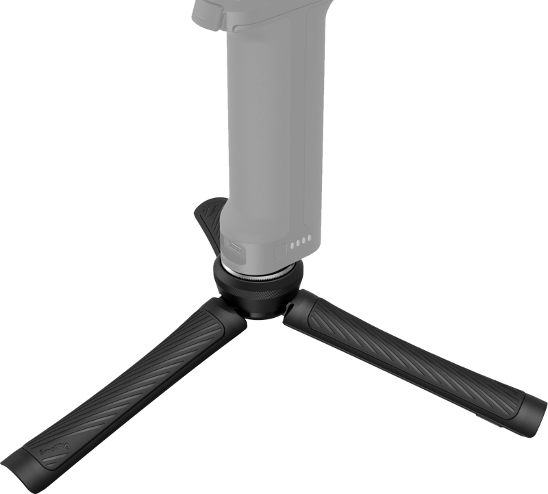 Lähikuva SmallRig 4117 Mini Quick-Release Tripod -jalustasta, joka on kompakti ja musta, jossa on kaksi ulosvedettyä jalkaa ja osittain näkyvä laite asennettuna sen päälle, valkoista taustaa vasten.