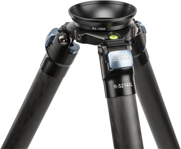Close-up of a black tripod with blue accents, featuring a Sirui RX-100A adapter bowl, a built-in bubble level and its three-legged top.