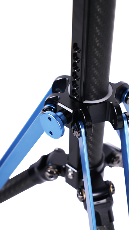 Close-up of the Sirui Light Stand DK-18 Carbon Fiber Air-Cushioned with blue aluminium legs, black carbon fibre centre column, adjustment holes and metal joints against a white background.