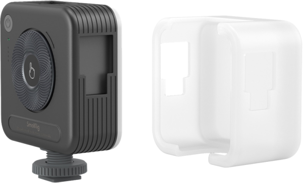 SmallRig 4367 Smartphone Vlog Tripod Kit VK-30 Advanced Version, a compact black unit with a round textured front and power button, is displayed next to a translucent white protective case against a plain background.