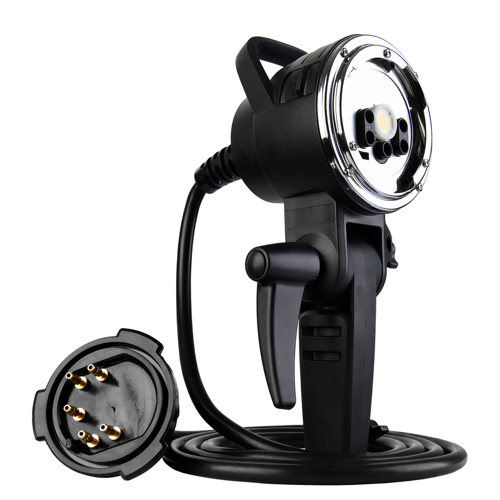 Godox AD600 Bowens Complete KIT -virtaliitin - musta, käsikäyttöinen, paksulla kaapelilla ja näkyvillä metallipinnoilla varustettu - seisoo pystyasennossa siten, että sen kierretty kaapeli on maassa ja pistoke osoittaa eteenpäin.