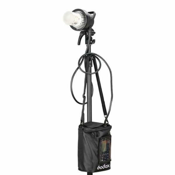 1560261311_816 Studio light with stand with cables and black Godox PB-600P Portable Bag for AD600Pro with transparent window and zippered flap attached under the light.