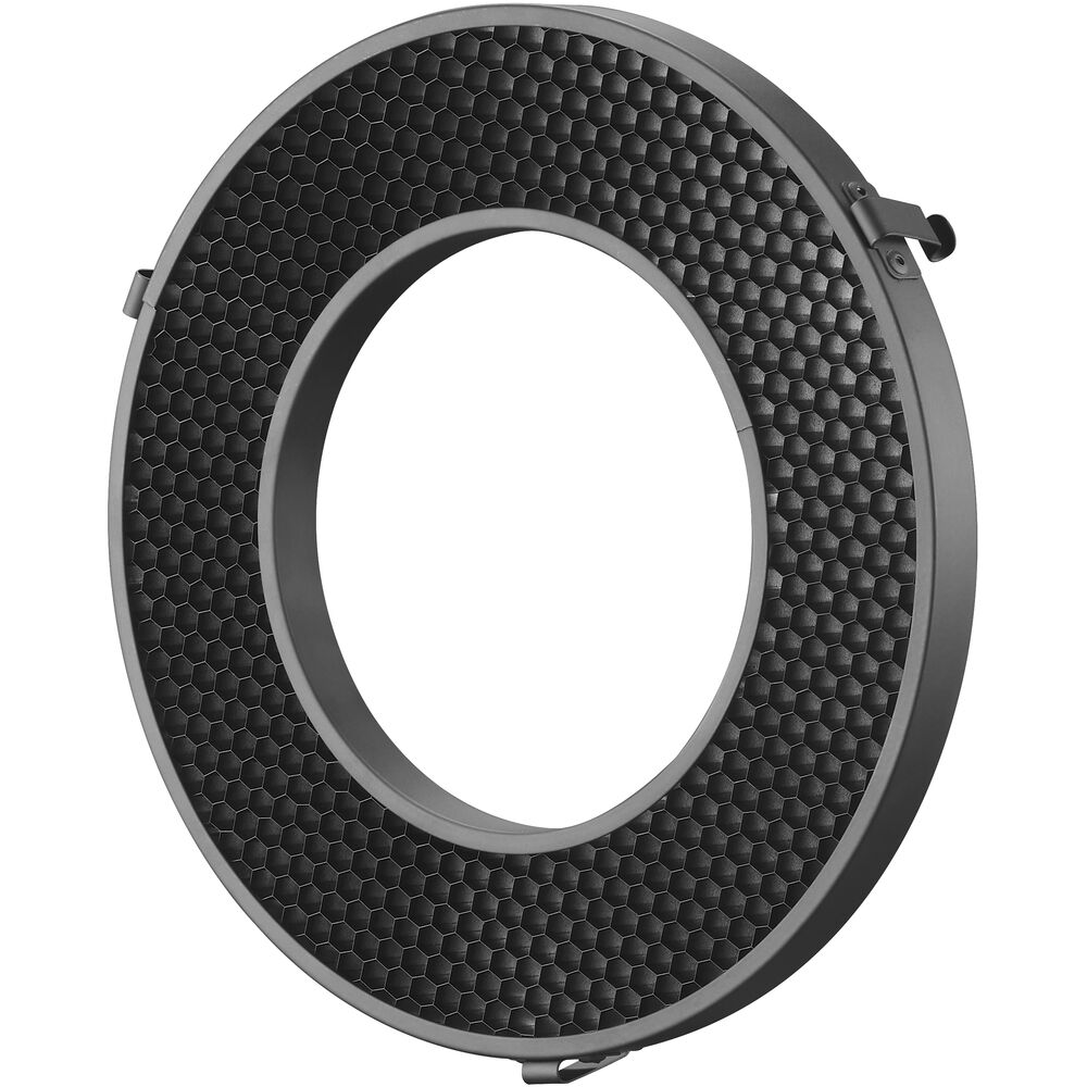Godox Honey Comb Grid 30 for R200 on pyöreä musta lisävaruste, jossa on keskireikä ja kuusikulmainen ristikkokuvio, joka on suunniteltu ohjaamaan valon leviämistä, kun sitä käytetään yhteensopivien valaisimien kanssa.