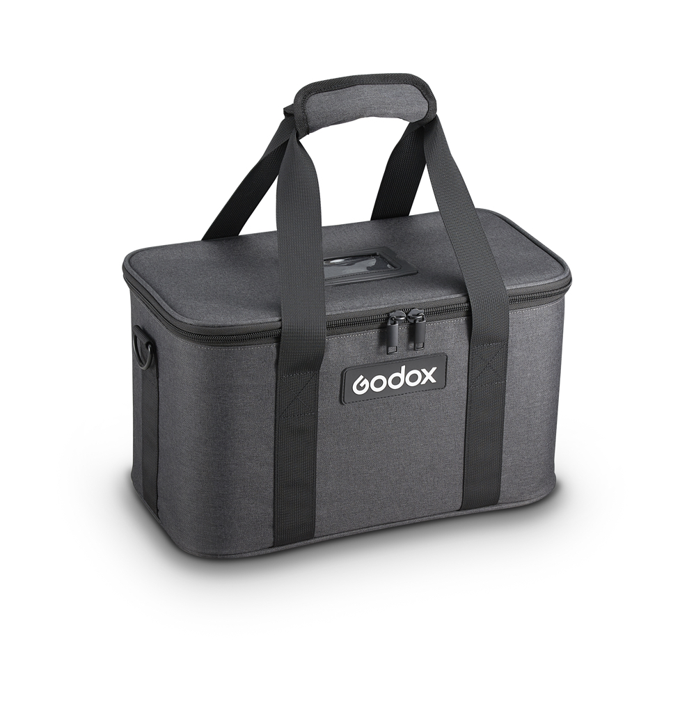 The Godox CB-26 Carry Bag for P2400 is a grey bag with black handles, padded grip and zippered lid designed for carrying photographic equipment.